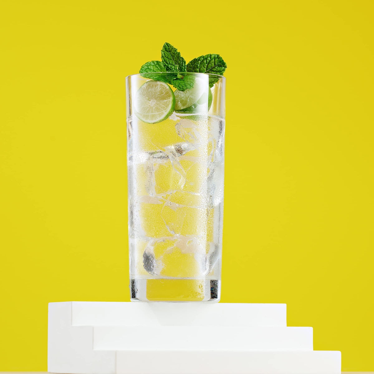 Godinger cylindrical highball glass suits modern and traditional table settings