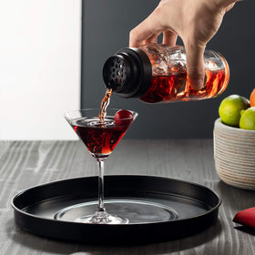 Godinger shaker with tight screw-on cap reduces leaks during shaking