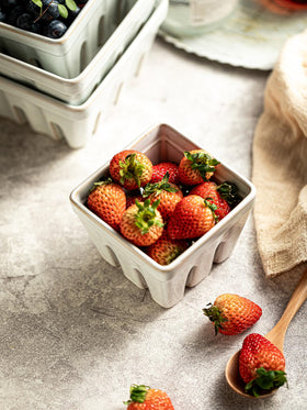 Gomakren white berry basket complements most kitchen decor styles.