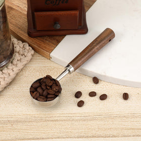 Gonzone Vintage spoon with walnut handle for comfortable, secure measuring.