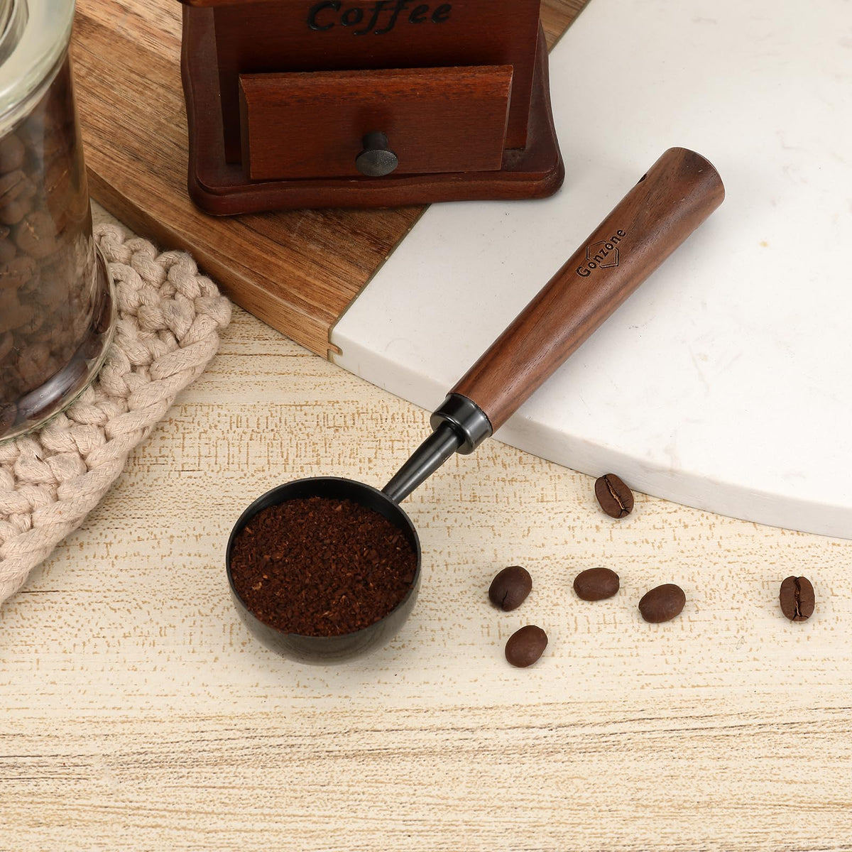Gonzone walnut-handle spoon offering a comfortable grip during measurement.