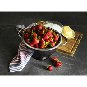 GoodCook Gourmet Colander filled with fruits showcases its 5-quart capacity for large batches.