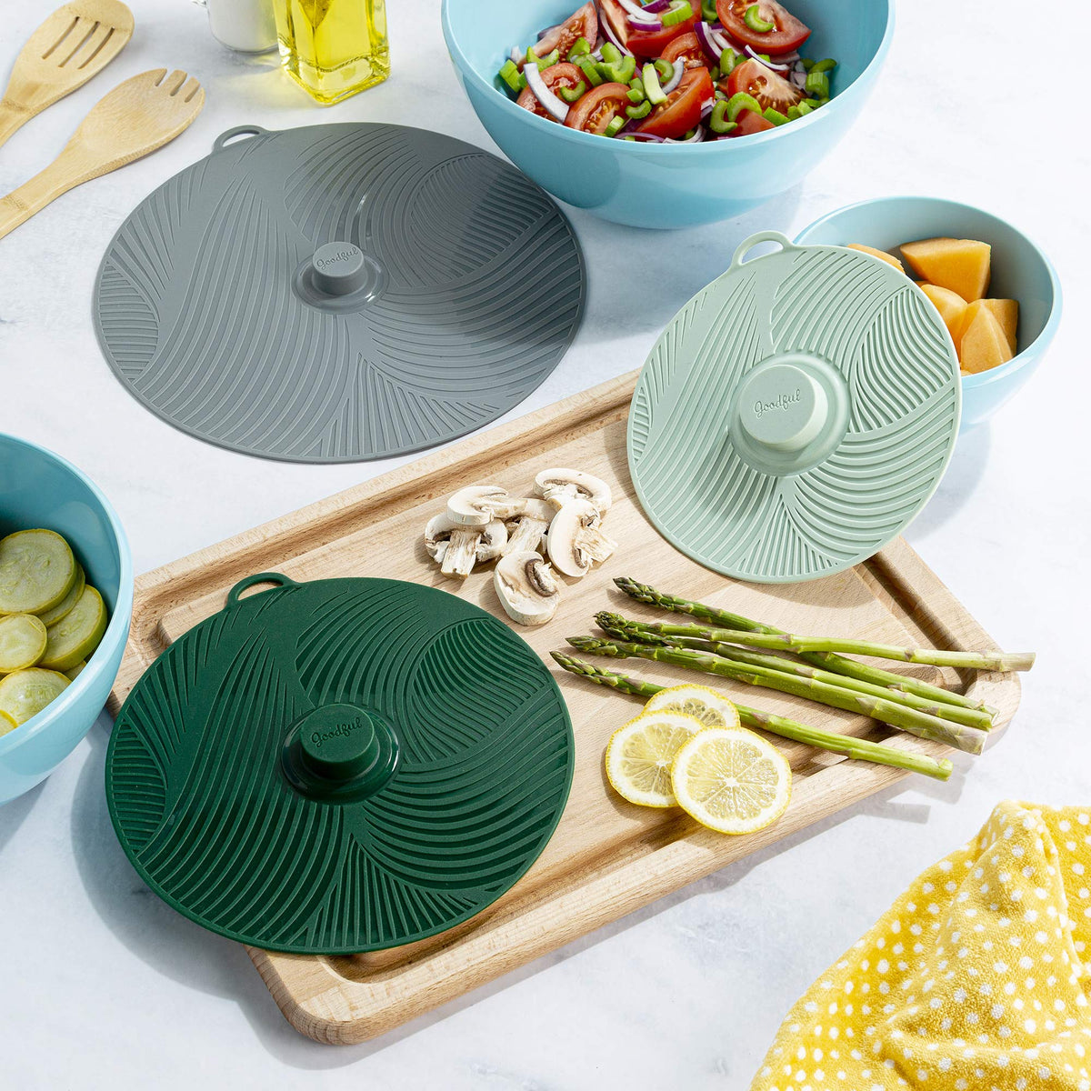 Goodful lid color variants in gray, green, and sage to match the kitchen.