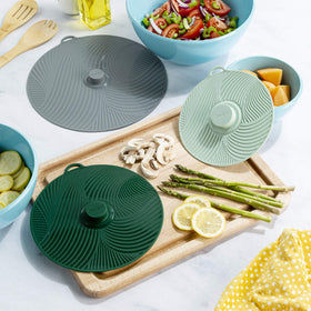Goodful lid color variants in gray, green, and sage to match the kitchen.