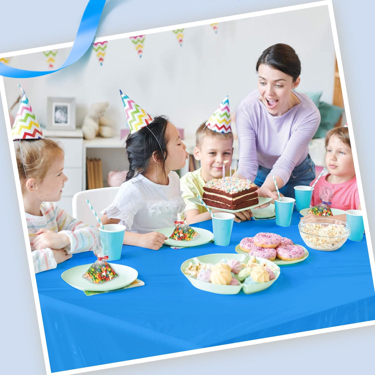 Goodluck blue disposable tablecloth demonstrates waterproof protection for spills.