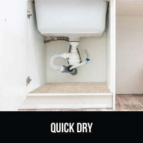 Gorilla Grip LeakGuard machine-washable mat being cleaned