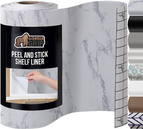 GORILLA GRIP peel-and-stick white marble liner on shelves for easy protection.