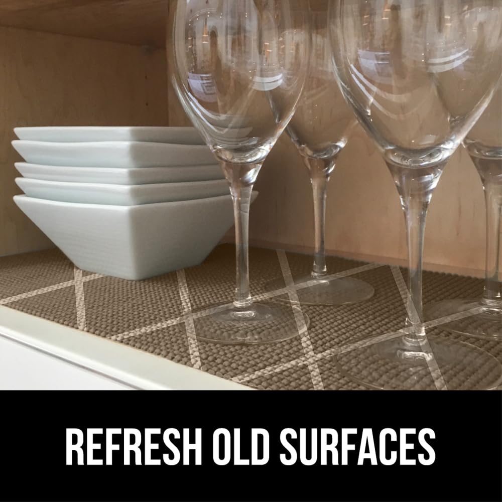 PowerGRIP liner organizing a cluttered drawer for easy access