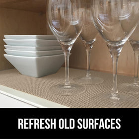 Gorilla Grip powerGRIP liner installed in a kitchen drawer keeps items in place.