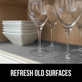 GORILLA GRIP powerGRIP liner used in kitchen cabinets for organization and protection.