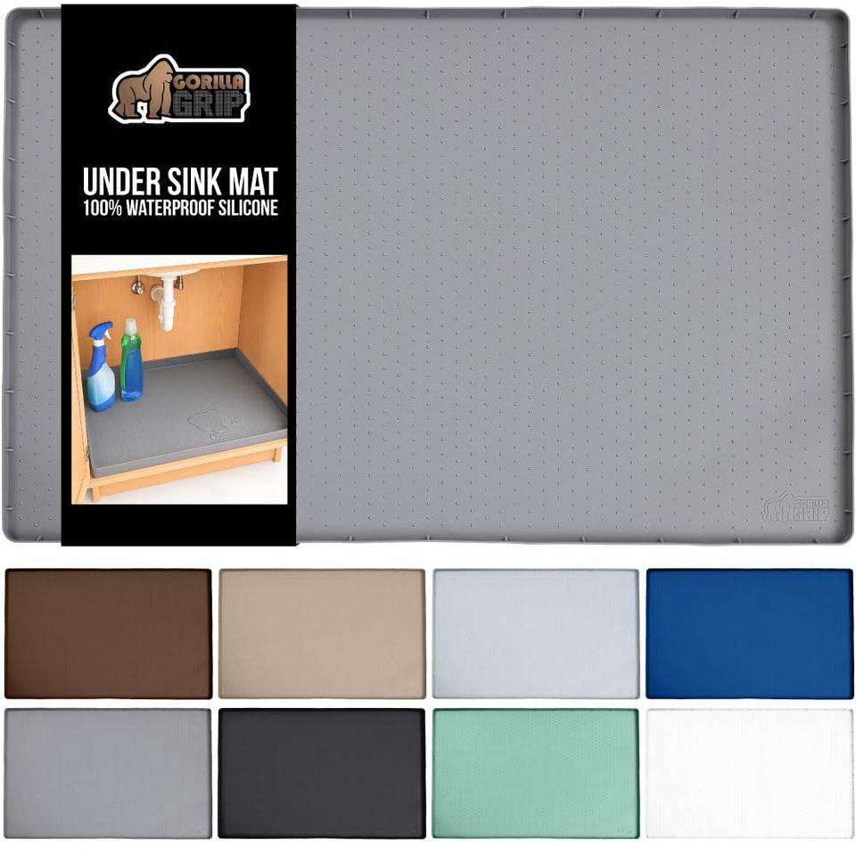 GORILLA GRIP under-sink mat close-up shows seamless silicone surface protecting cabinets from spills.