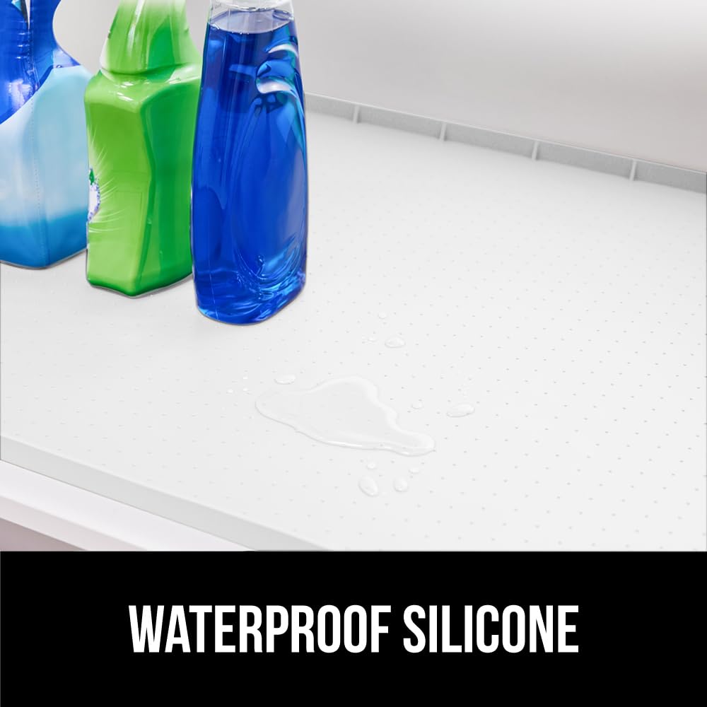 Gorilla Grip under-sink mat stays flat and grips cabinet surfaces during use.