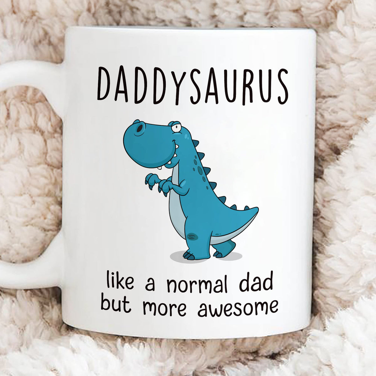 Gossby DADDYSAURUS mug design detail emphasizes cheerful dinosaur motif for dad's desk.