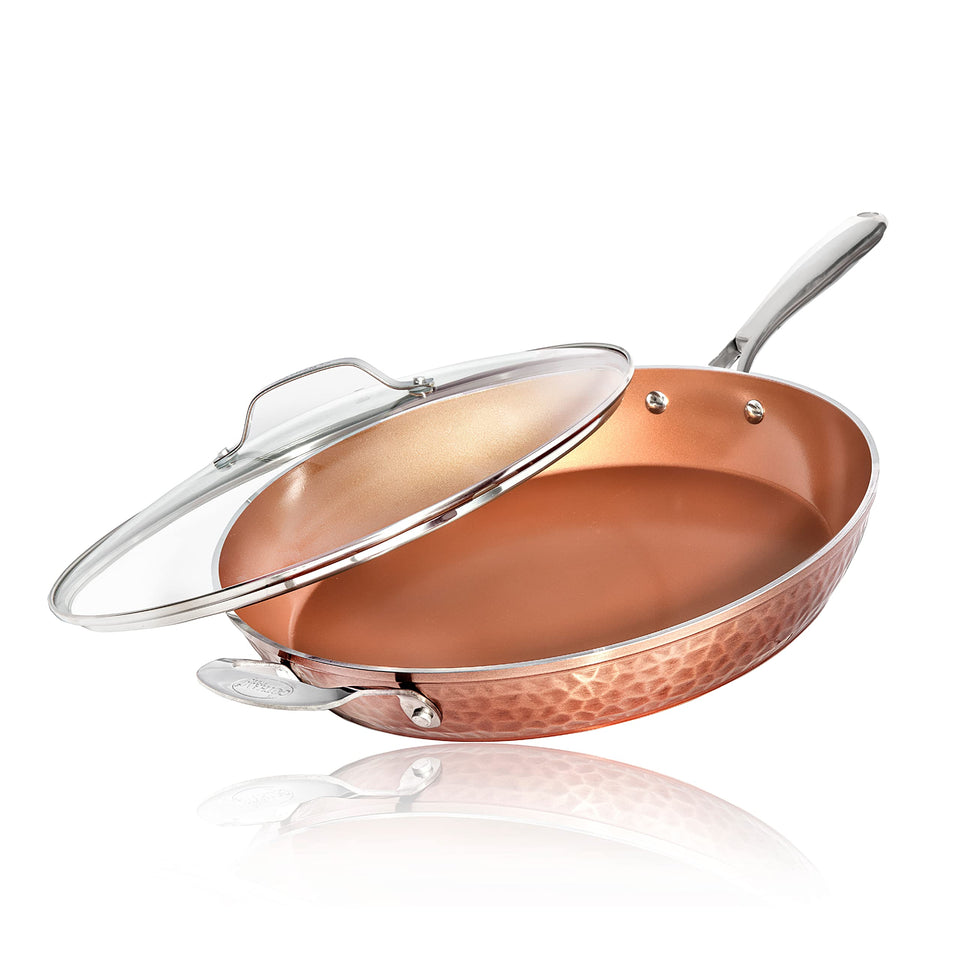 Gotham Steel hammered copper 14-inch pan with lid offers even heat for family meals.