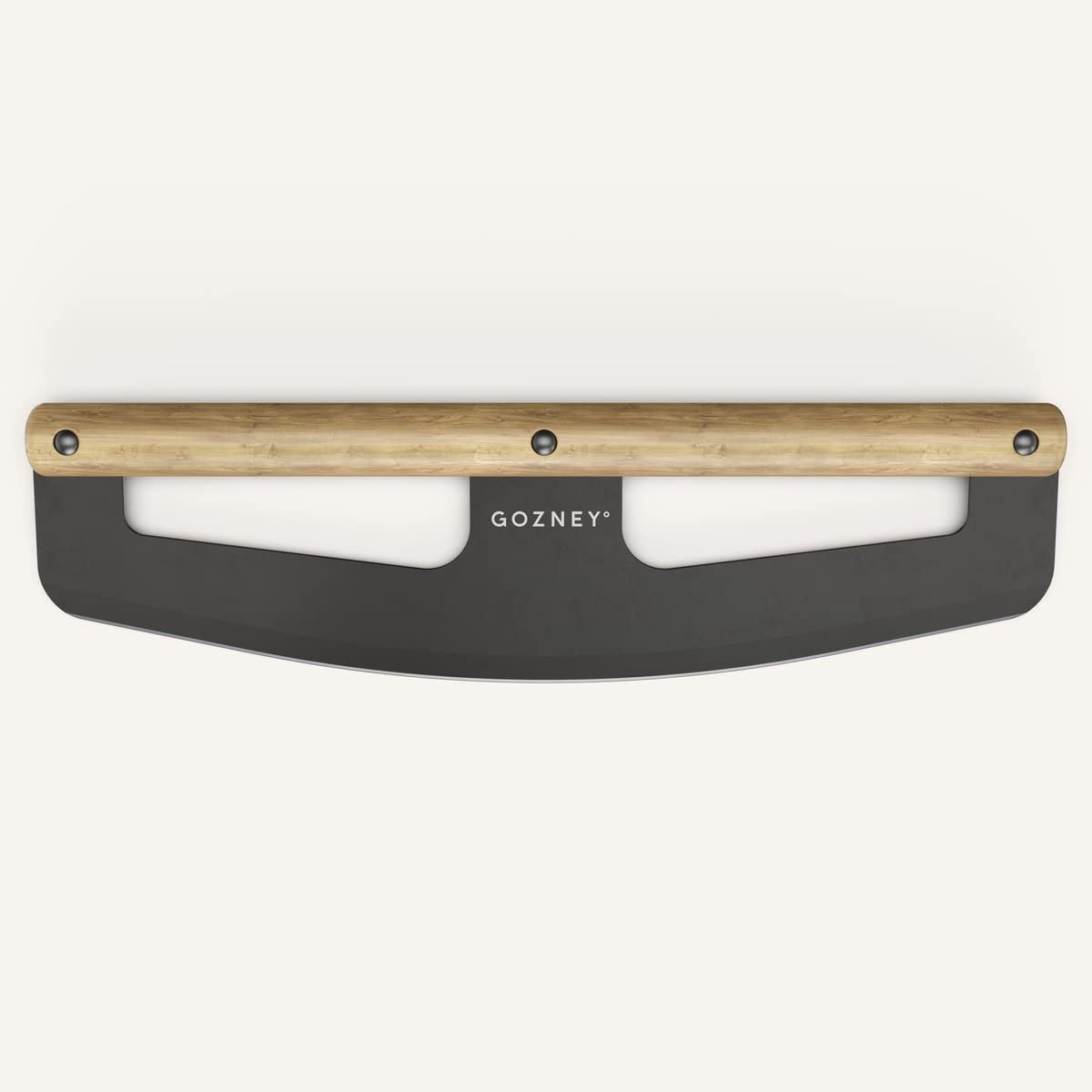 Gozney pizza rocker in action shows smooth rolling cuts keeping toppings in place