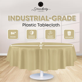 Grandipity beige round tablecloth on dining table adds elegance and disposable convenience.