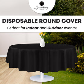 Grandipity tablecloth protecting surface from spills and crafts messes.
