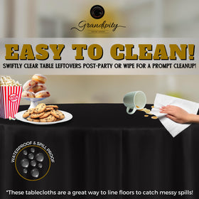 Grandipity round tablecloth displayed on a black table for elegant dining ambiance.
