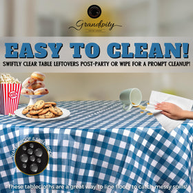Grandipity round tablecloth on a table, protecting surface from spills.