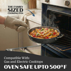 Granitestone Ceraluxe 14-inch frying pan in an oven-ready stance for finishing dishes