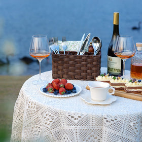 GRANNY SAYS wicker utensil holder on dining table with silverware