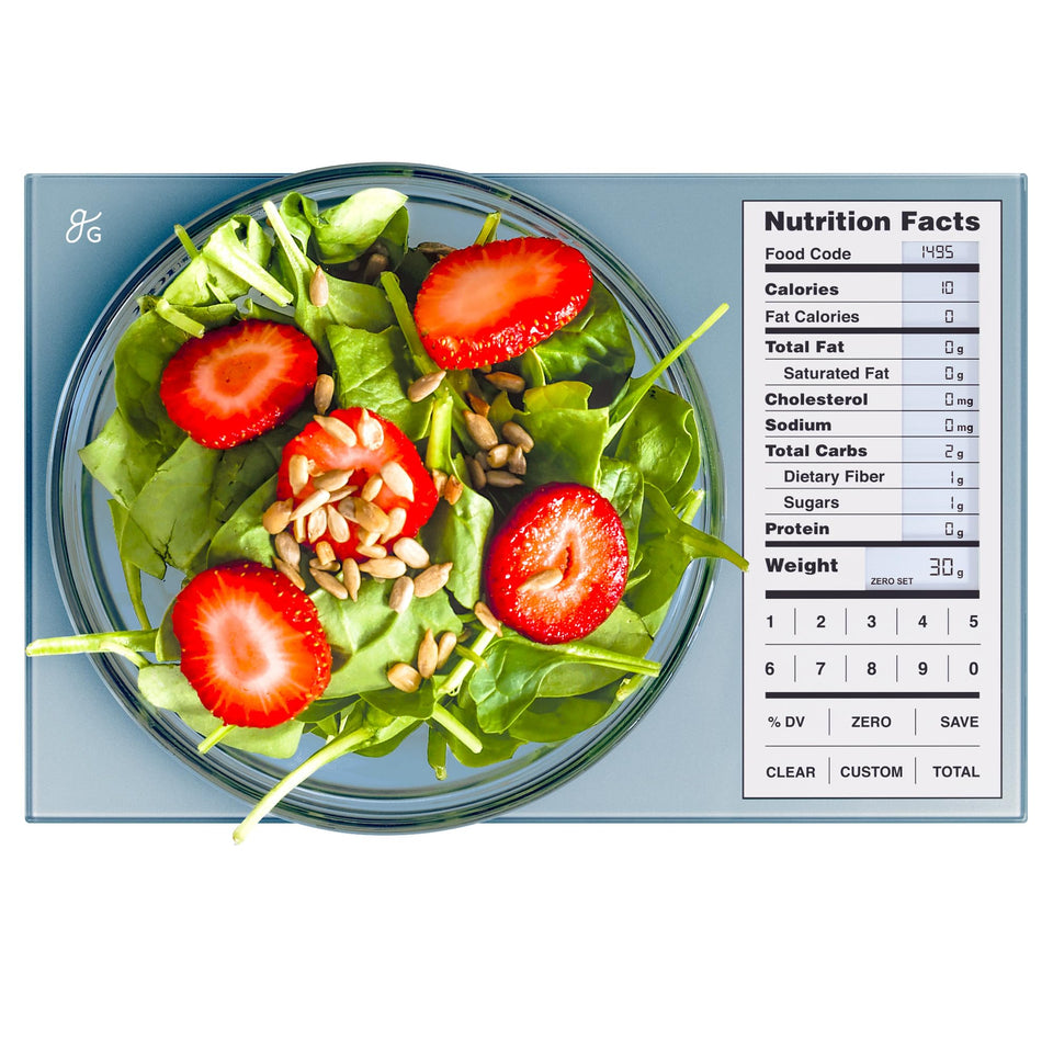 Greater Goods Digital Nutrition Scale on a kitchen counter with a clear display for precise meals.