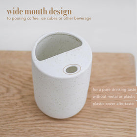 Greefun speckle white ceramic cup with sip-top lid for easy one-handed use.
