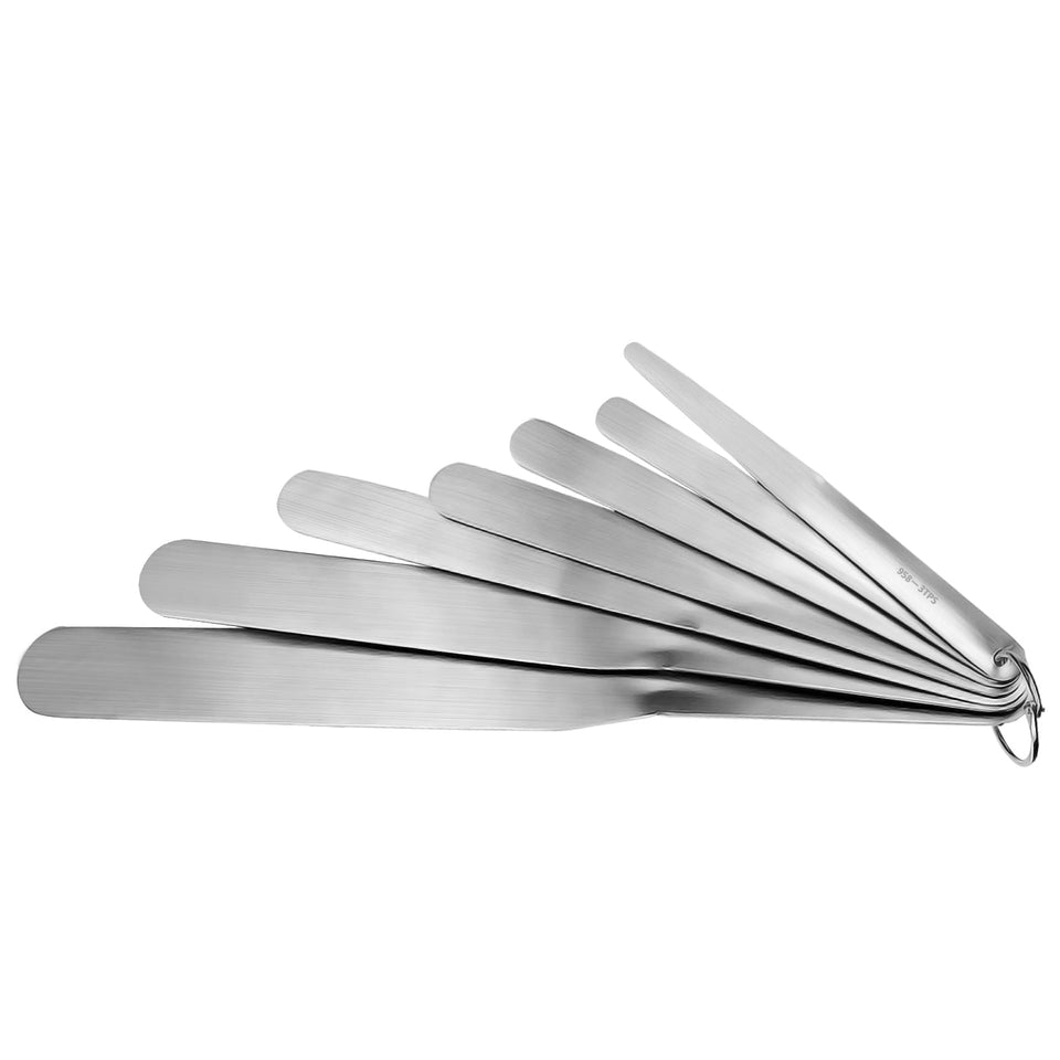 Green living 958-G01 seven-piece caulking spatula set for versatile home sealing tasks.