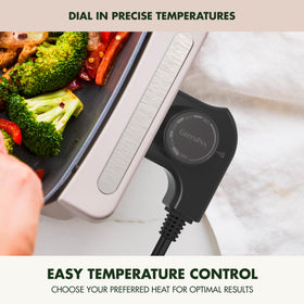 GreenPan skillet with cool-touch handles for safe transfer.