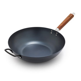 GreenPan Kyoto 14-inch wok on stove with flat bottom for quick heating.
