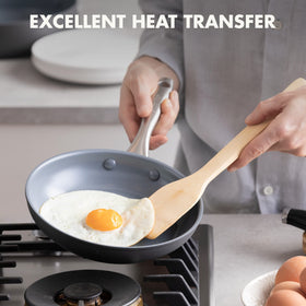 GreenPan Lima ergonomic handle closeup shows comfortable stainless steel grip.