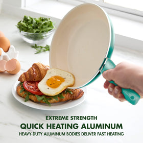 GreenPan Rio silicone spatula with wooden handle for safe flipping.