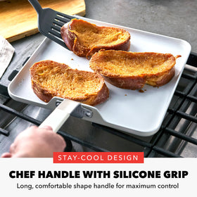 Stay-cool chef handle on GreenPan griddle provides comfortable control during cooking.