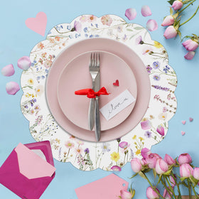G.R.I curled-edge placemats add decorative detail to tables.