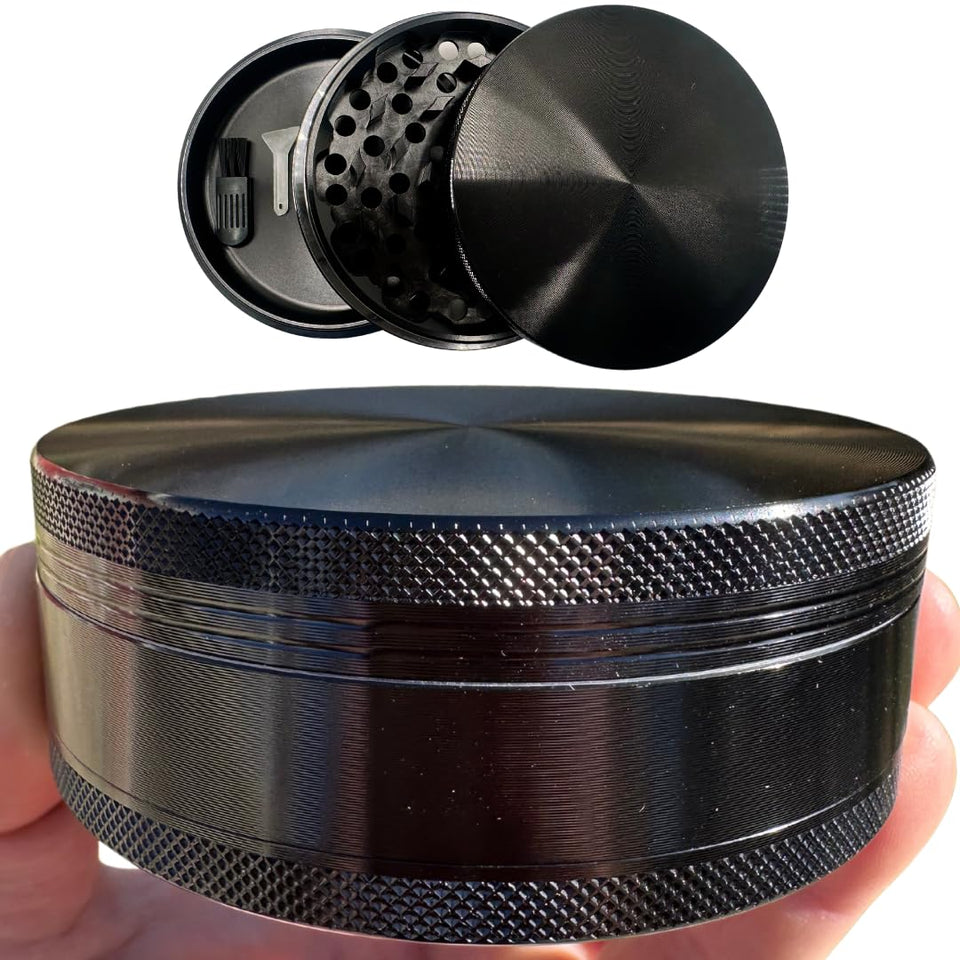 Grinder Garage 4-inch black spice mill with knurled grip for secure grinding.