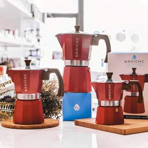 GROSCHE Milano red moka pot steam pours into cup for bold coffee.