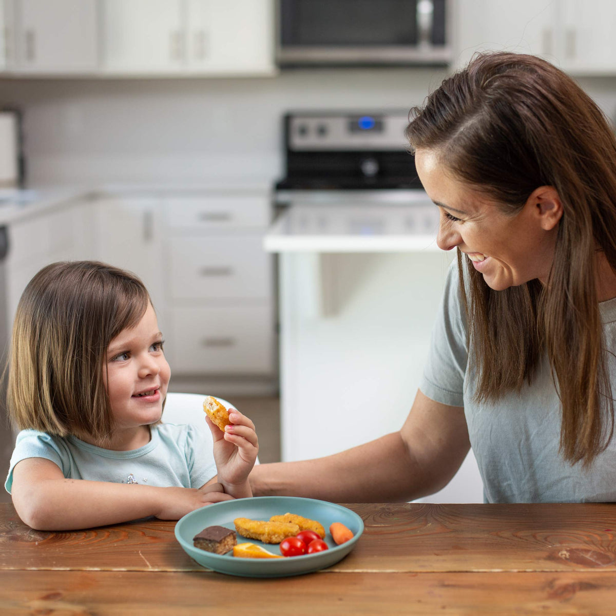 Grow Forward dishwasher-safe stackable kids dishes simplify post-meal cleanup.