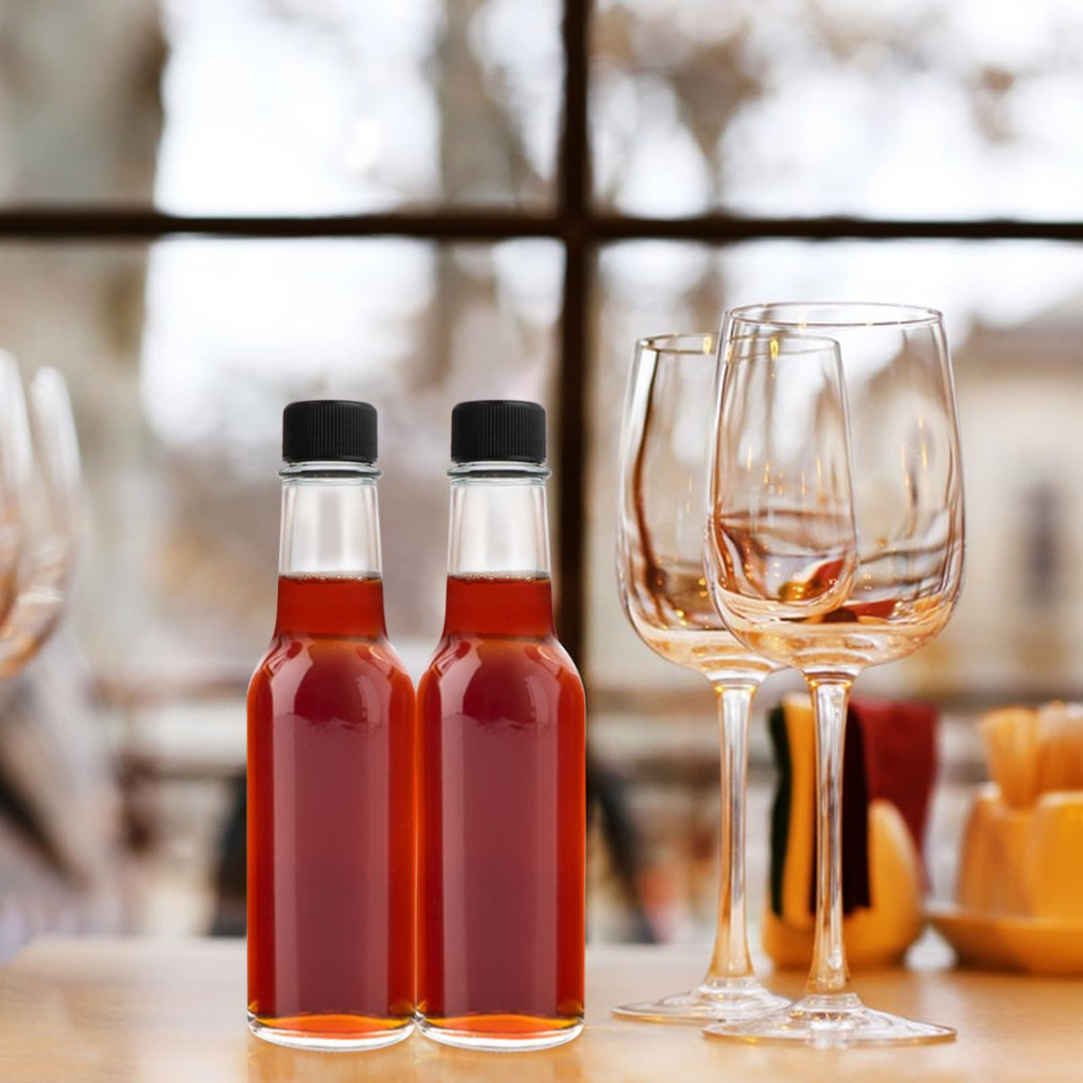 GUANENA BPA-free glass bottle offers safe, reusable storage.