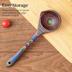 Gudamaye Pakkawood Rainbow Ladle mid-pour in soup demonstrates easy-spout design