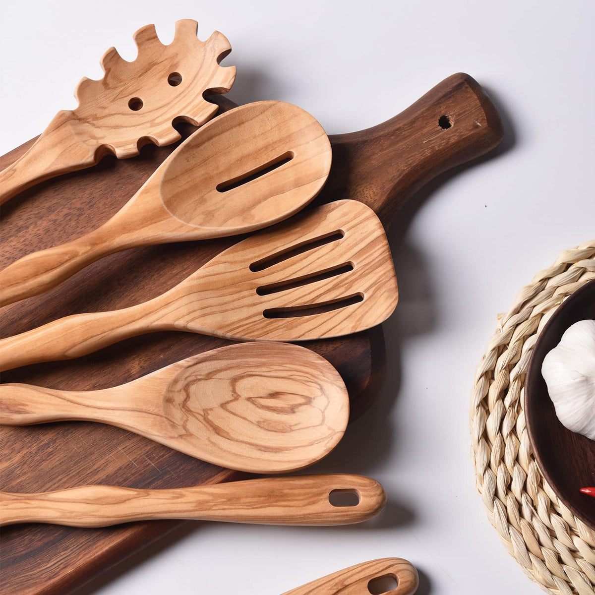 Gudamaye slotted spoon drains liquids while sautéing for even cooking.