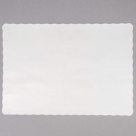 Guffman off-white placemat with scalloped edge enhances formal table presentation.