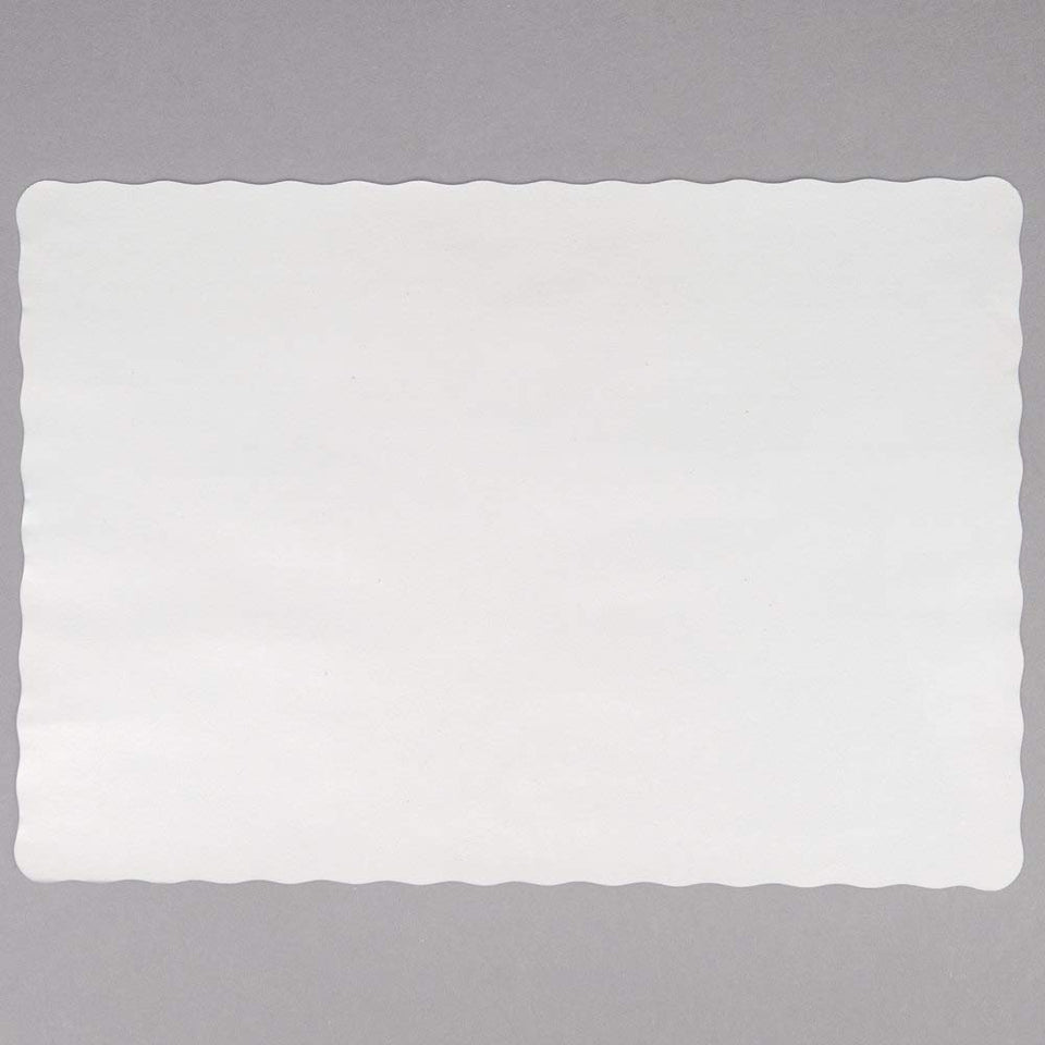 Guffman off-white placemat with scalloped edge enhances formal table presentation.