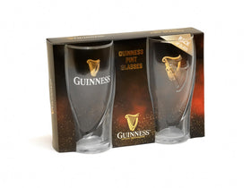 Guinness 20oz twin-pack resting on bar counter emphasizing sharing