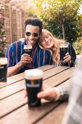 Guinness Gravity pint glass 20oz pour close-up to enjoy creamy head