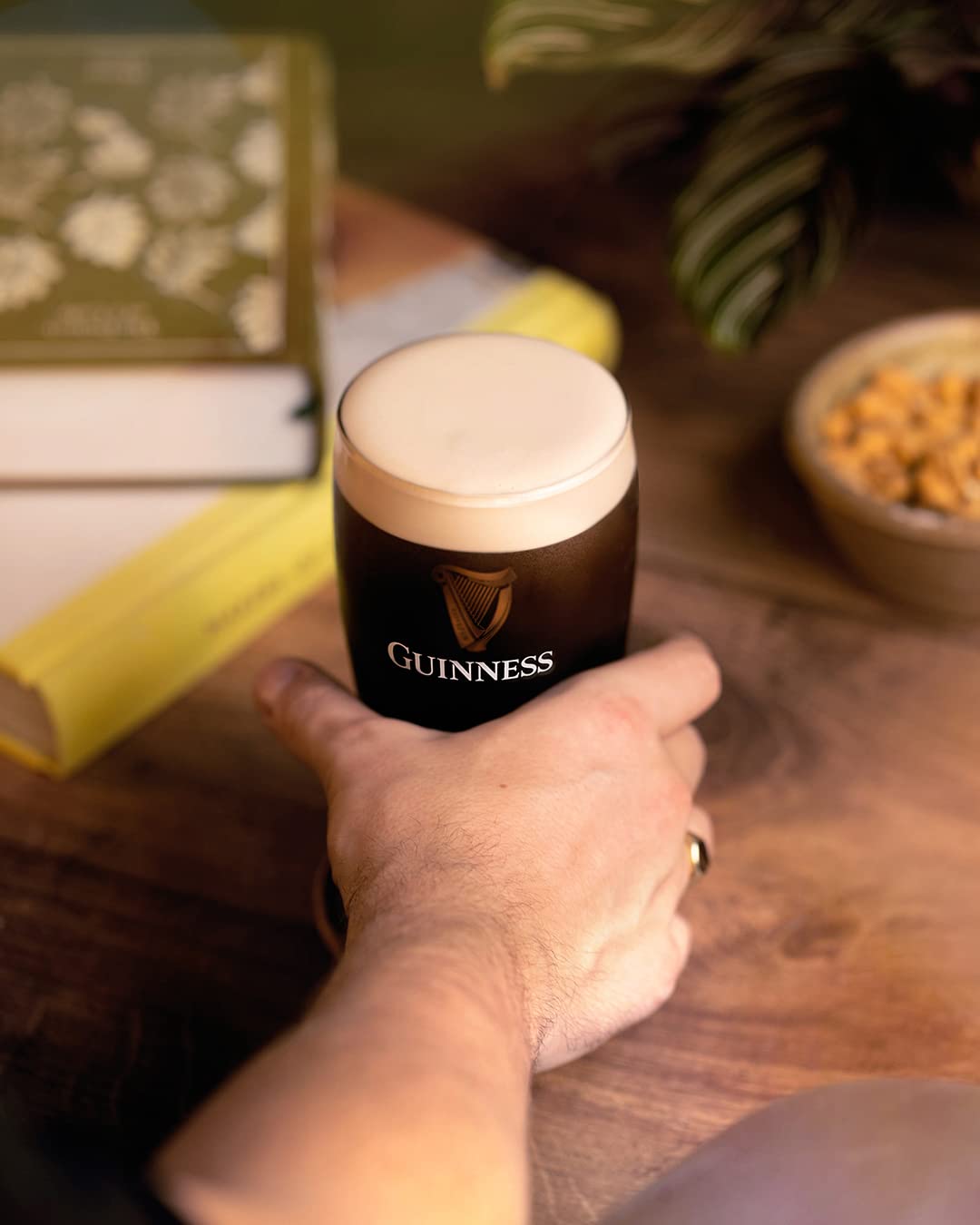 Guinness Gravity pint glass side contour highlighting ergonomic grip for everyday use