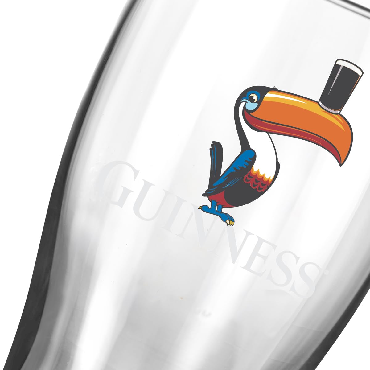 Guinness Toucan glass close-up showing curved body for creamy head and aroma.
