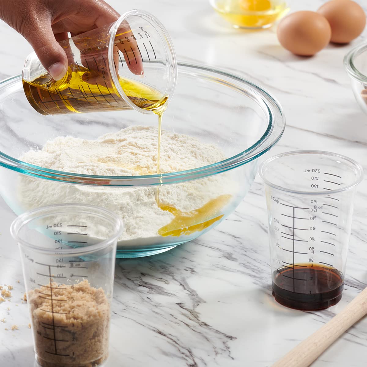 GUSTO stackable 10 oz cups shown neatly saved in a compact stack.