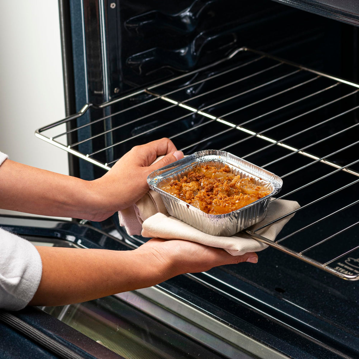 GUSTO aluminum pans deliver even heating for consistent cooking.