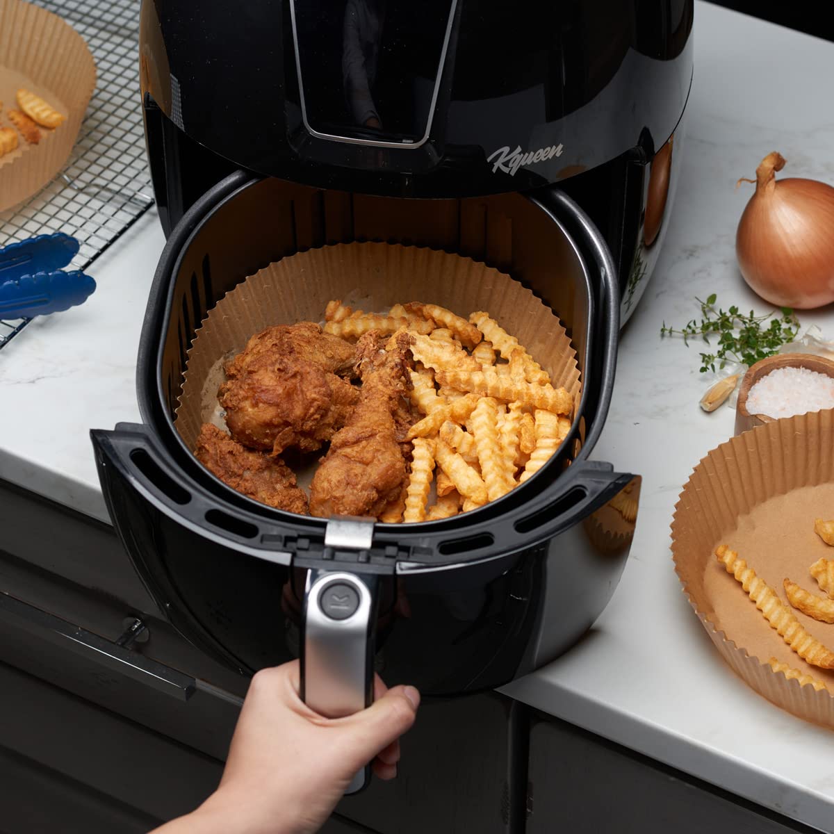 GUSTO liner inside a 5-8 qt air fryer for easy cleanup.