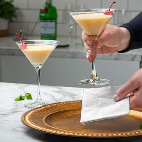 GUSTO white napkins unfolded to 9x9 for larger plate settings.